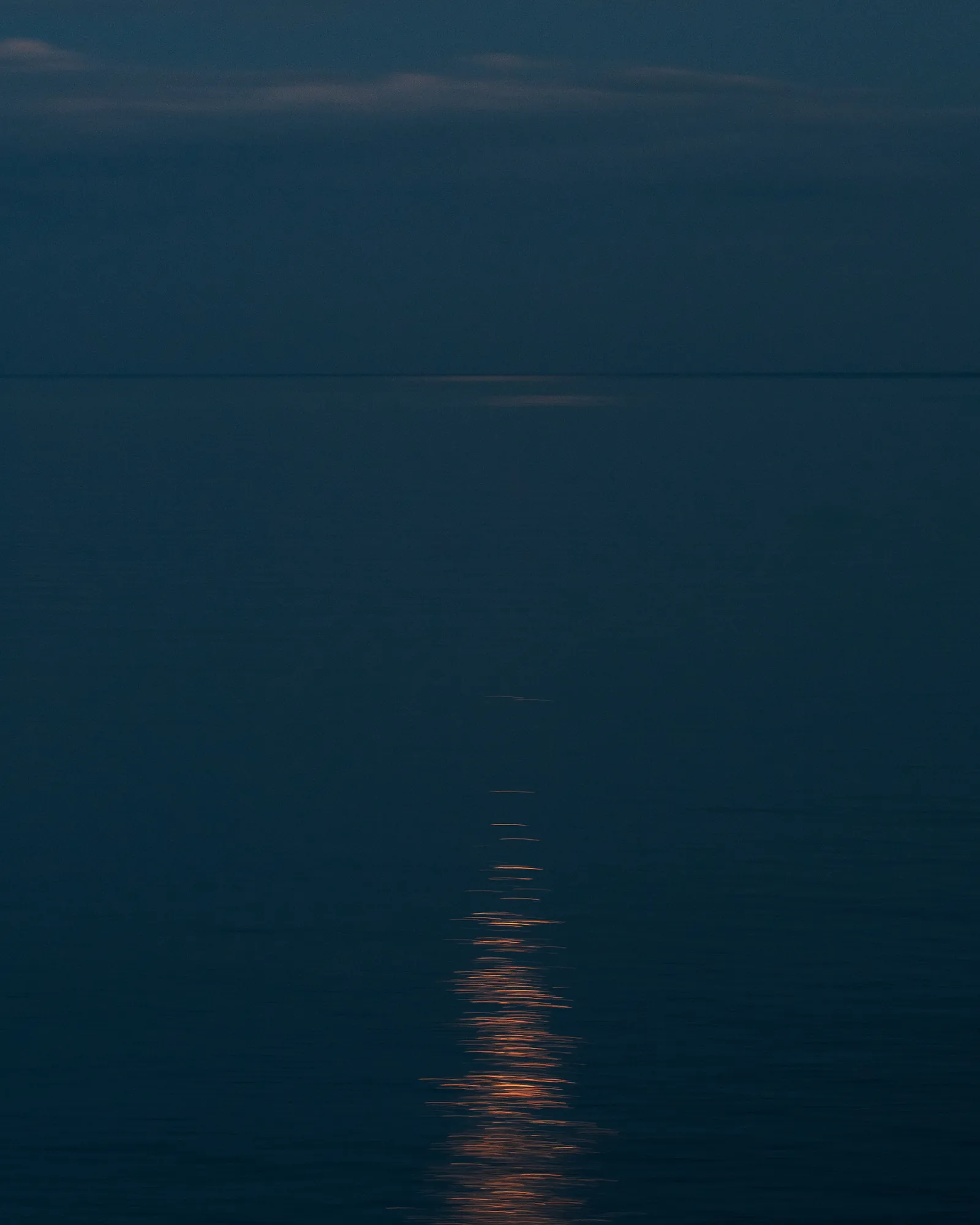 Melted moon, Falmouth Bay. 2021.